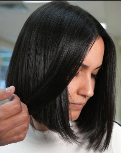 Client with a sleek black bob